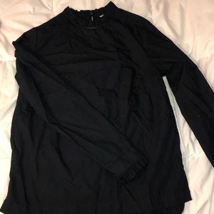 Mock neck blouse with ruffle detail